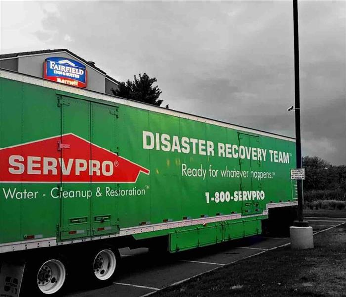 Disaster Recovery truck parked.